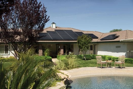 Green loans for solar panels on house roof with pool 